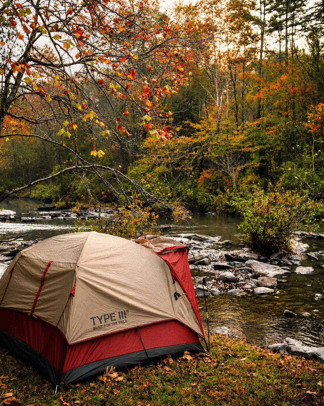 Tent campsite beside a river